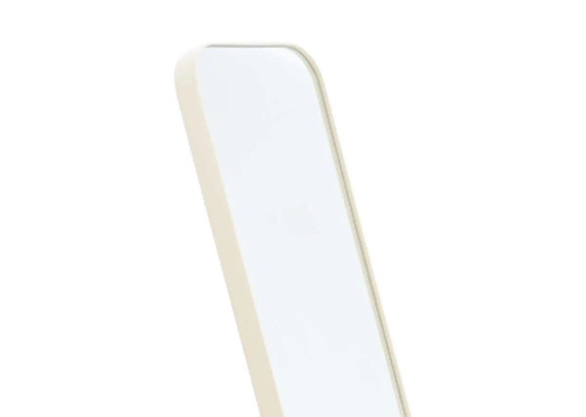 A cream rectangular free standing mirror from EZ Livings Taina range.Closeup of cream frame
