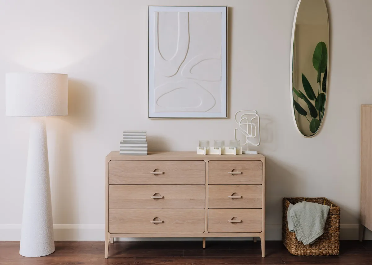 A lifestyle image of the Jay dresser with Gateway canvas with Darian mirror & Tullow lamp. 