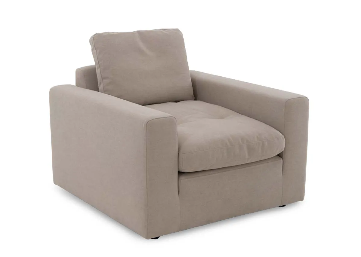 A beige linen armchair from EZ Livings Cozy range. Angled view