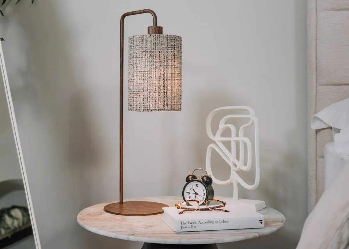 A lifestyle image of the Elodie Lamp on the slade table.