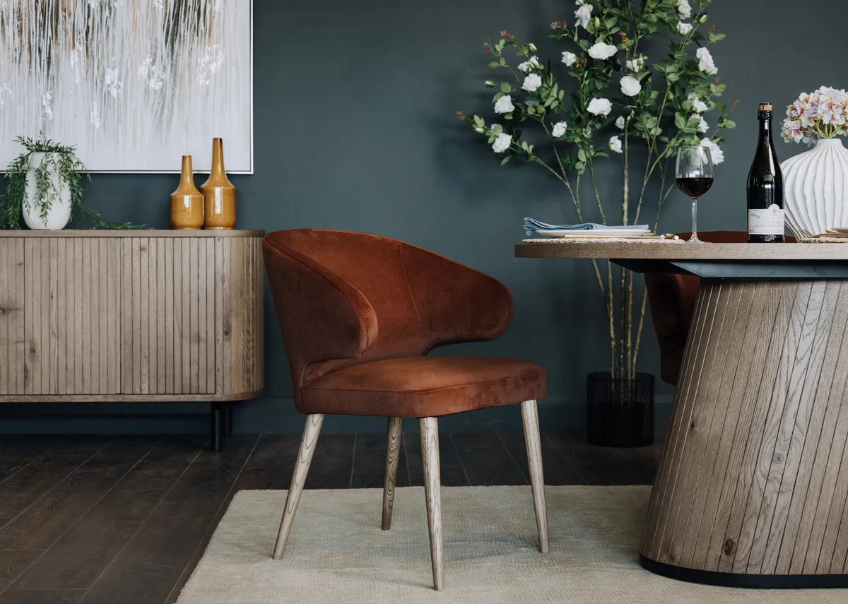 A victor bronze fabric with grey legs and the Vega grey dining table.