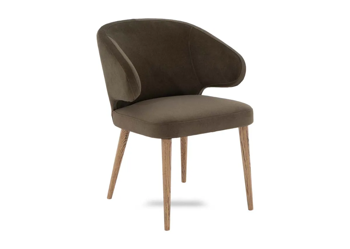 A green fabric dining chair from EZ Livings Victor range. Angled view of curved brace sides