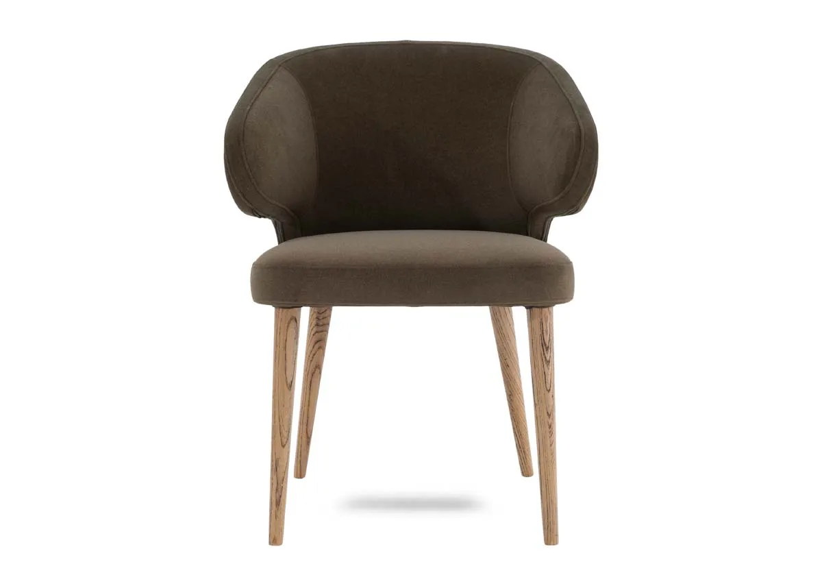 A green fabric dining chair from EZ Livings Victor range. Front view of luxury velvet fabric