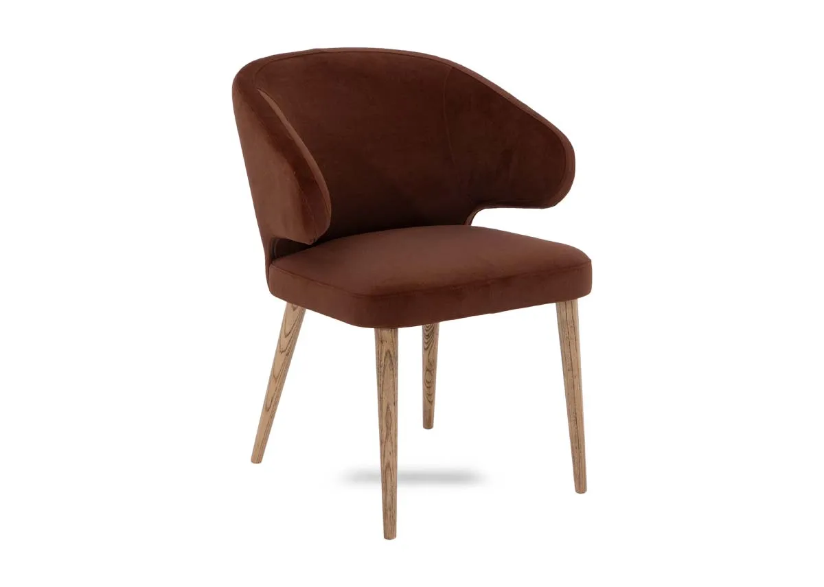 A bronze fabric dining chair from EZ Livings Victor range. Angled view of curved brace sides.