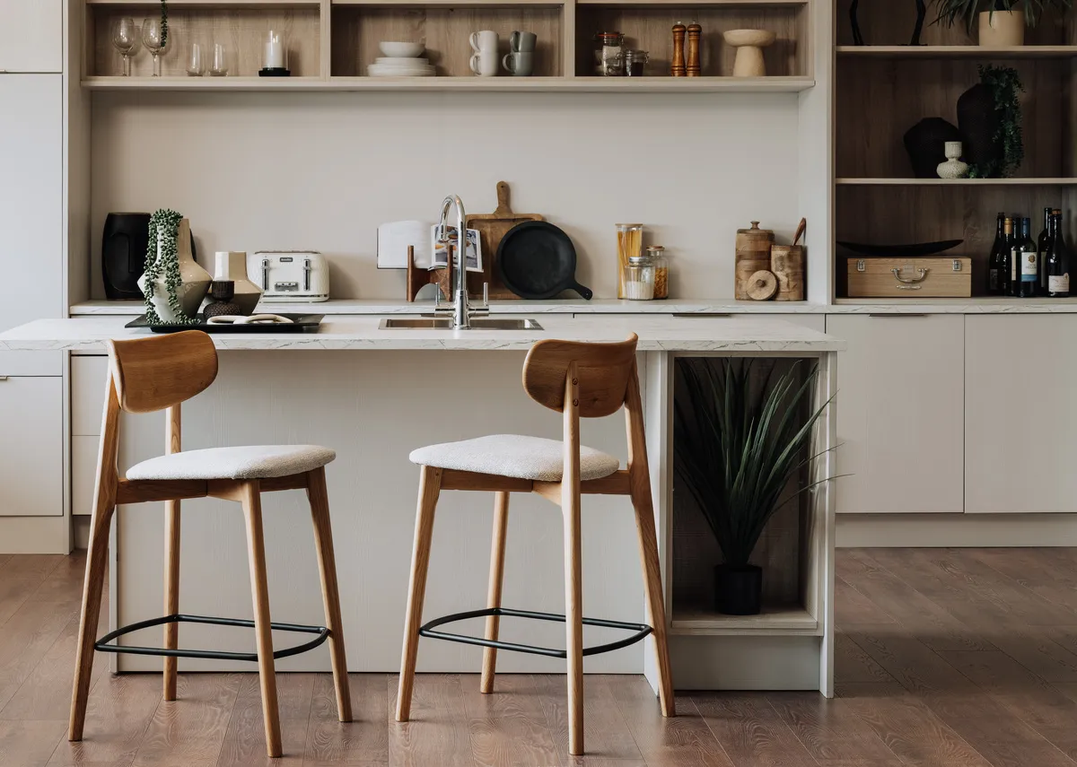 A lifestyle image of the Bari stools with metal rungs