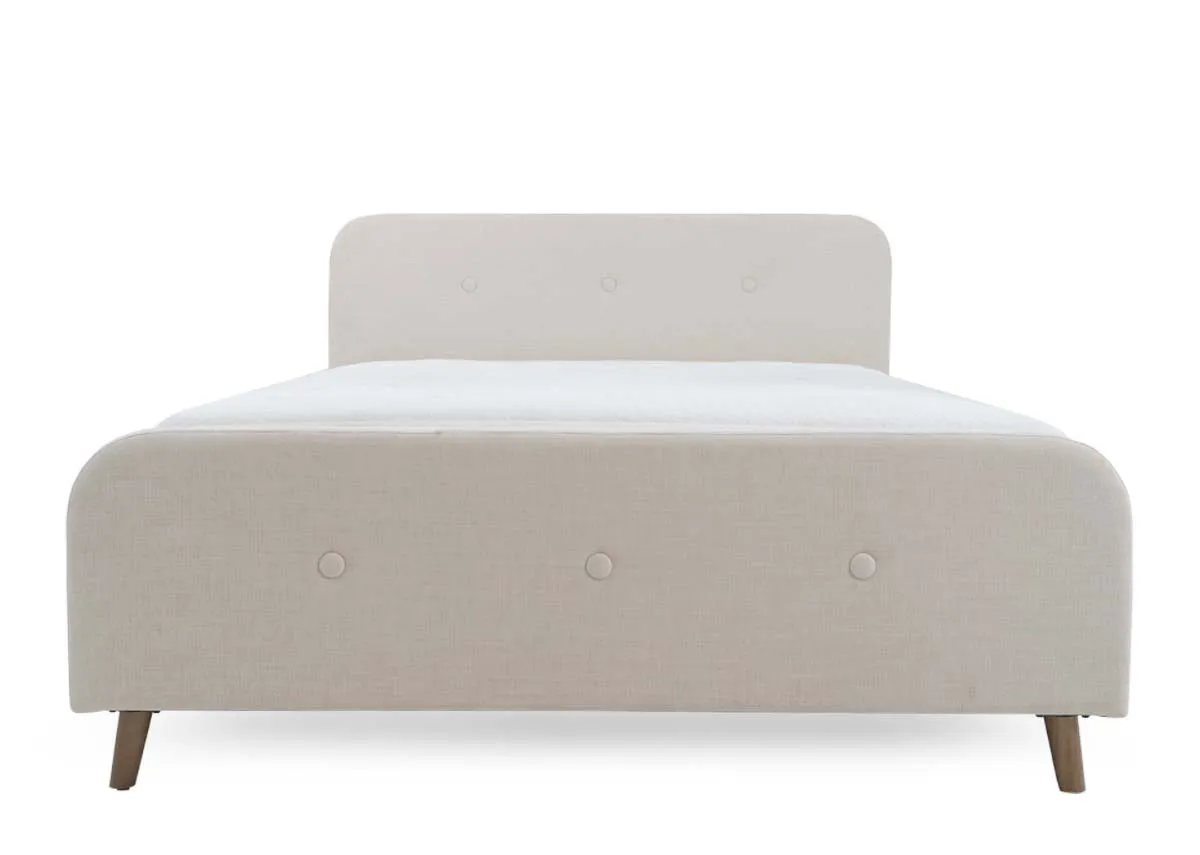 A cream 4ft6 bedframe from EZ Livings Serena range. Front voew of upholstered hight footboard