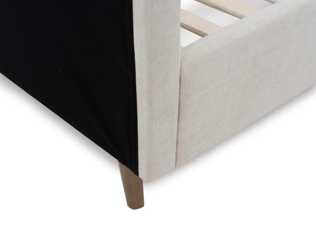A cream 4ft6 bedframe from EZ Livings Serena range. A Closeup of the wood leg