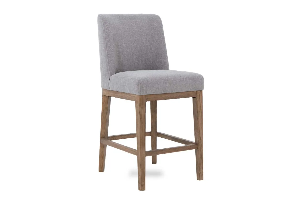A light grey fabric counter stool from EZ Livings Naxos range. Angled view