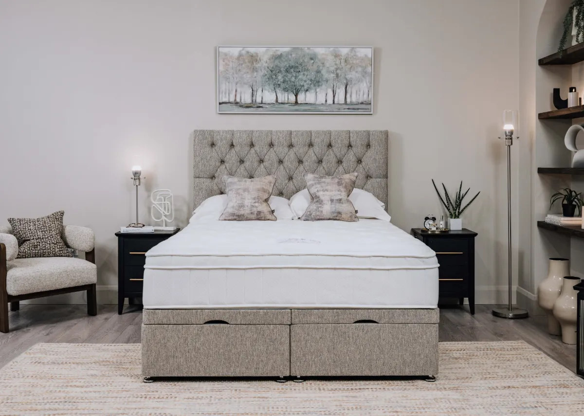 A lifestyle image of the Claddagh 1800 Mattress with the Chevron side table and daydream canvas