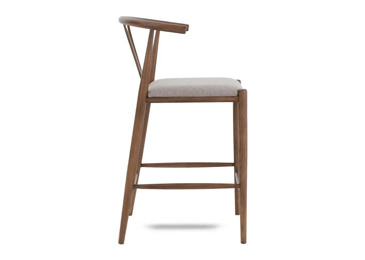 A chestnut frame bar stool with fabric seat from EZ Livings Cape range. Side view