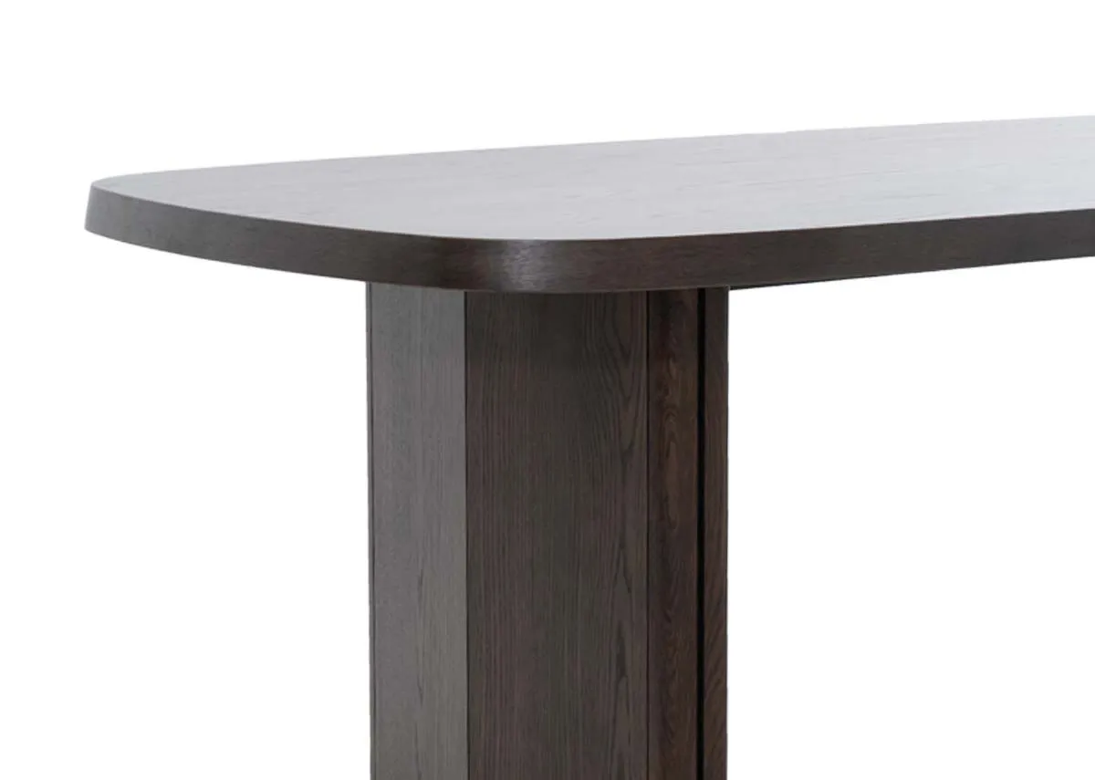A dark brown wood dining table from EZ Livings Natu range.Closeup of veneer finish