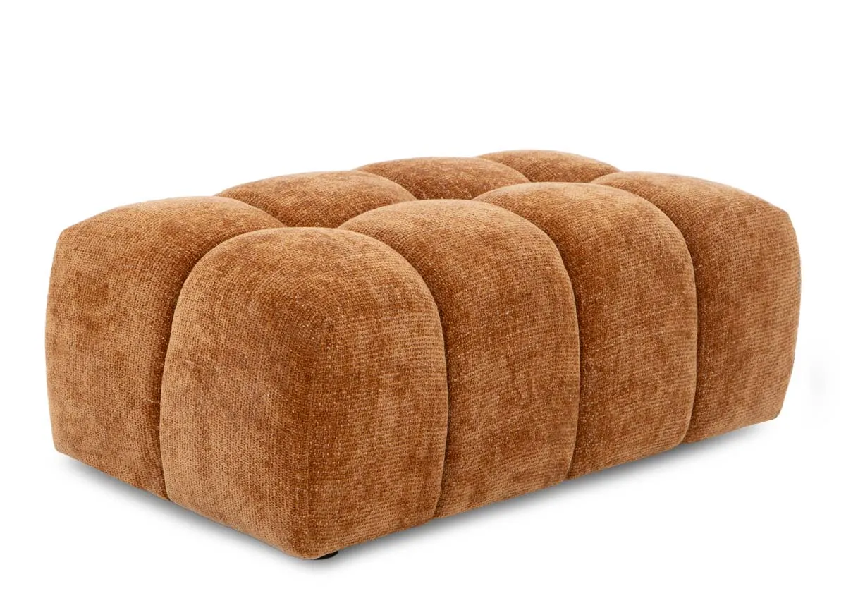 An orange rust fabric footstool from EZ Livings Matera range. Angled view of the pillow stitched style.