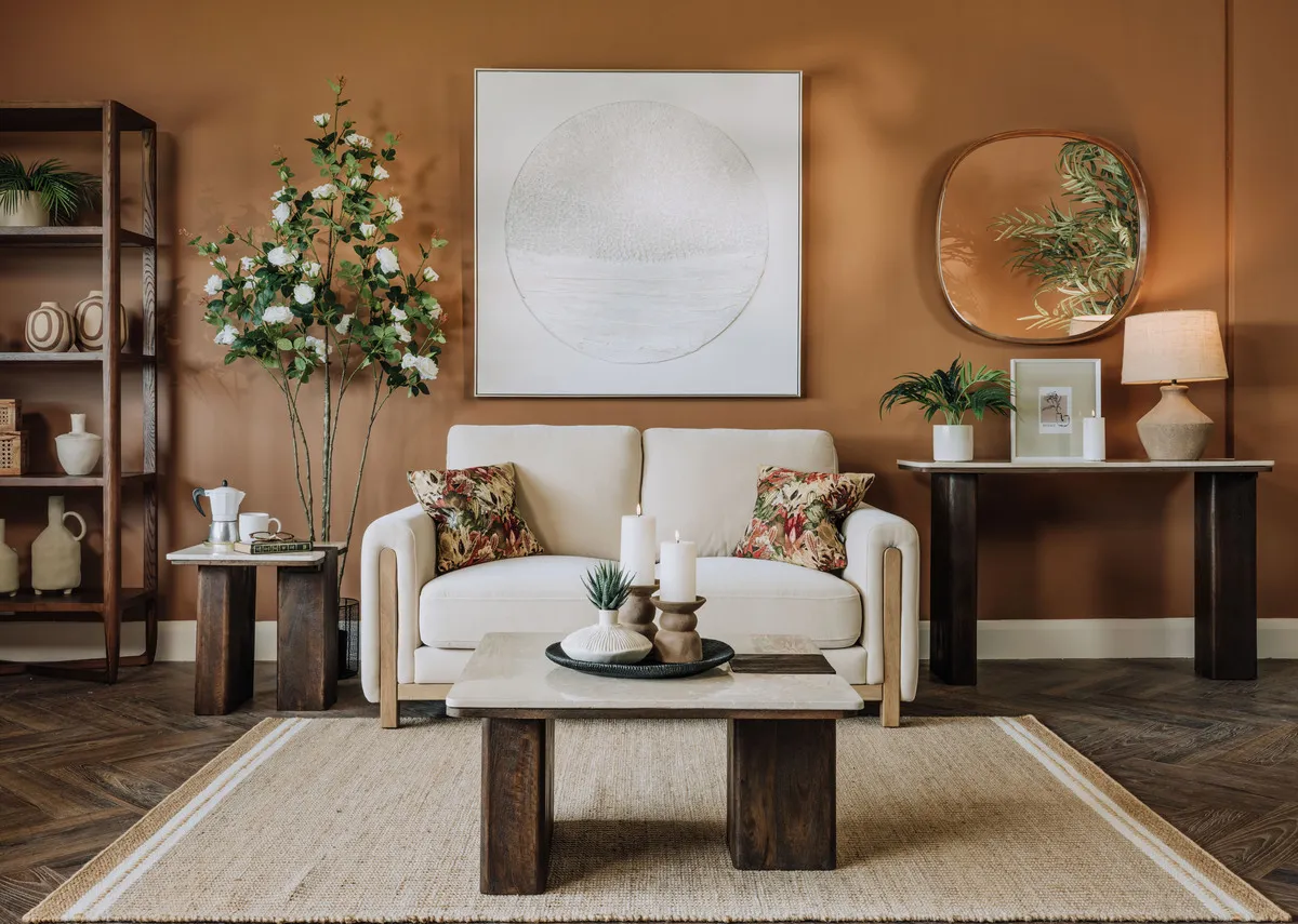 A lifetsyle image of the Miller stone 3 seater sofa with Pathways canvas and windsor tables.