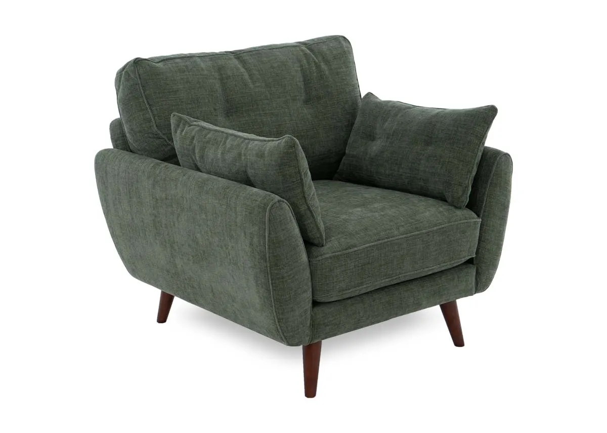 An olive green fabric armchair with retro shape from EZ Livings Caoimhe range. Angled view of wide seat and bolsters.