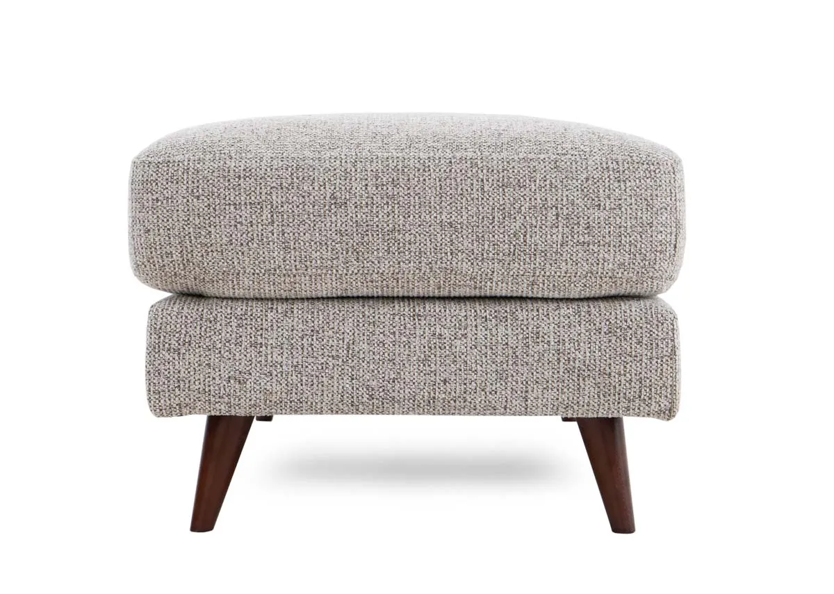 A rectangular footstool from EZ Livings Bailey range. Side view of walnut feet