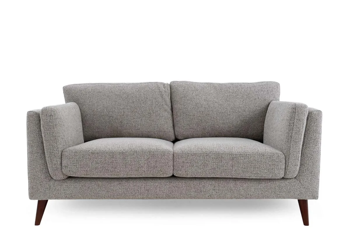A light brown accent 2 seater sofa from EZ Livings Bailey range.Front view of tapered wood feet.