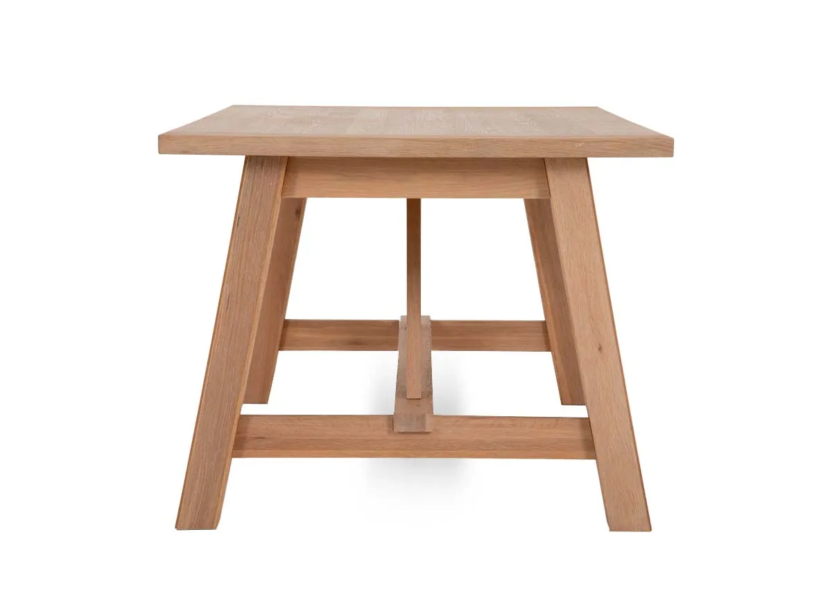 An oak dining table from EZ Livings Albany range. Front view of table extended fully
