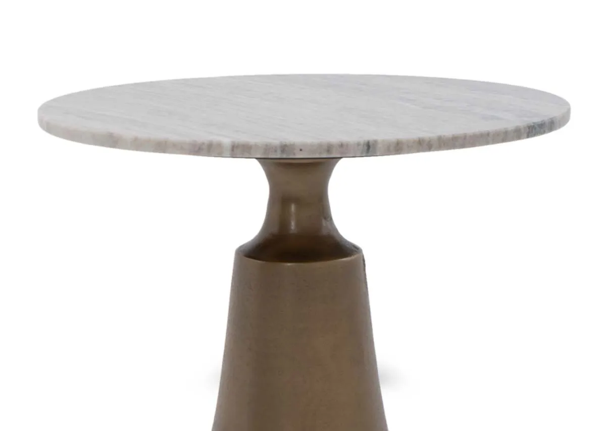 A brass stem side table with marble top from EZ Livings Pyramid range. Closeup of marble round top