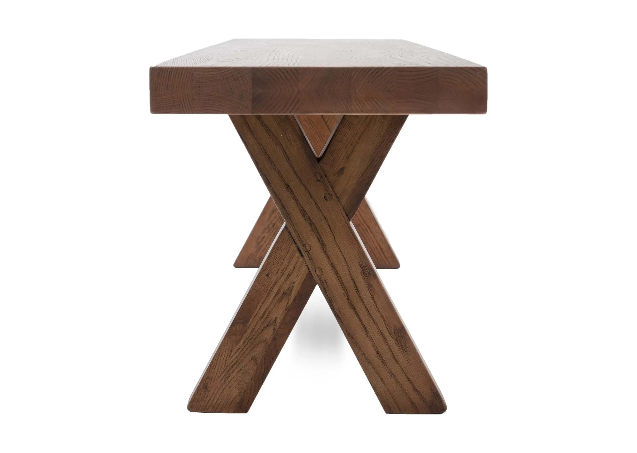 An all oak dining bench with x legs from EZ Livings Davos range.Smide view