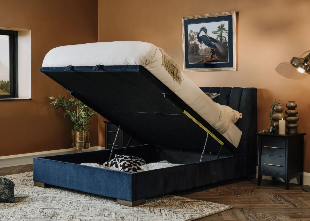 A 5ft ottoman bed in petrol blue from EZ Livings Lancelot range. 