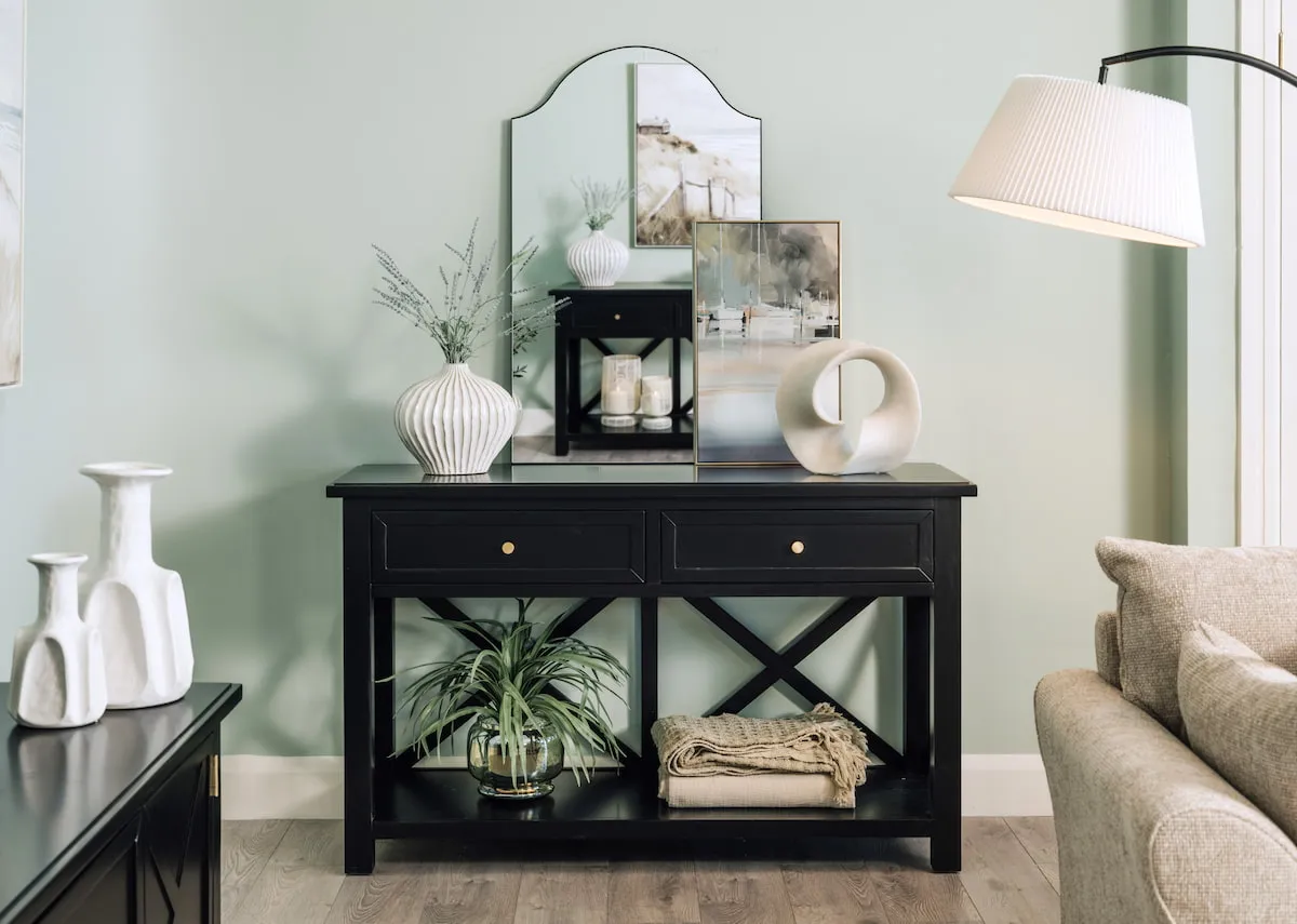 A lifestyle image of the Hampton 2 drawer console with new vases