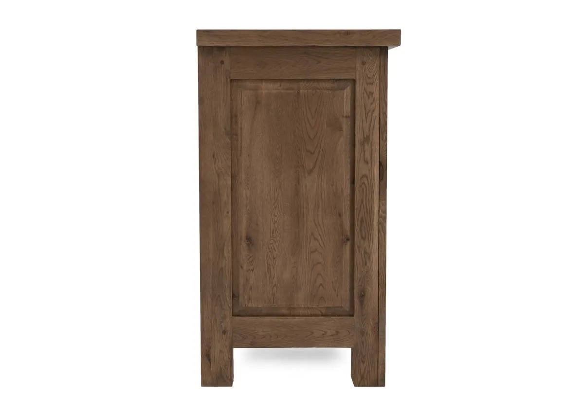 A 2 door and 6 drawer sideboard from EZ Livings Naxos range. Side view of oak finish.