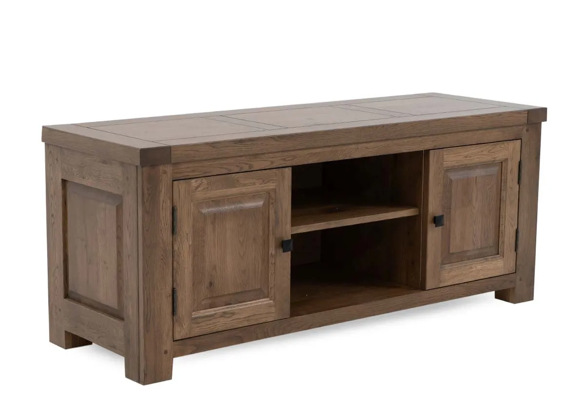 An oak 2 door tv stand from EZ Livings Naxos range. Angled view of thick top tv unit.