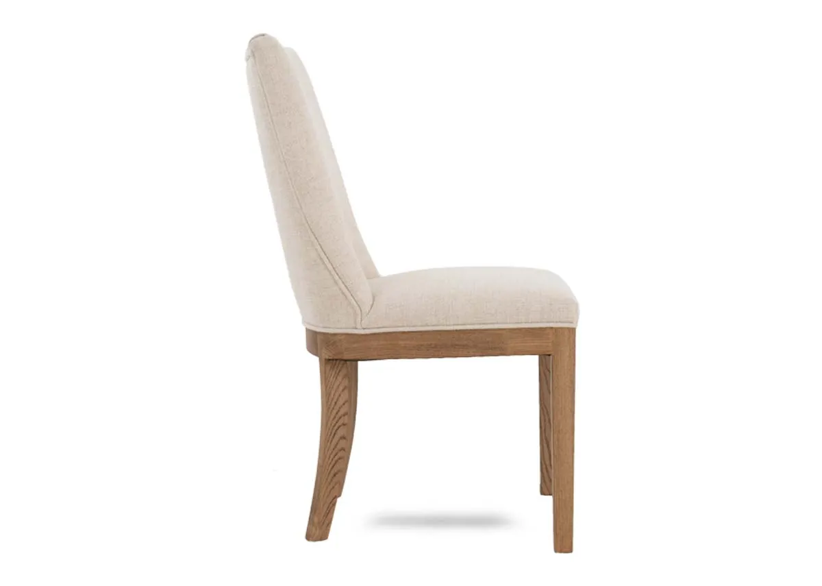 A cream fabric dining chair with oak frame from EZ Livings Becky range. Side view