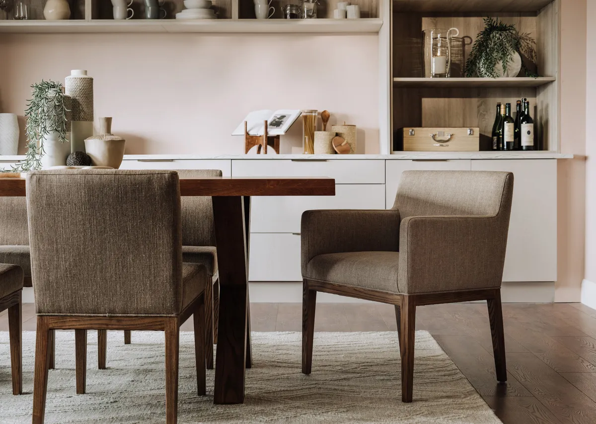 A lifestyle image of the Davos chairs with Davos dining table