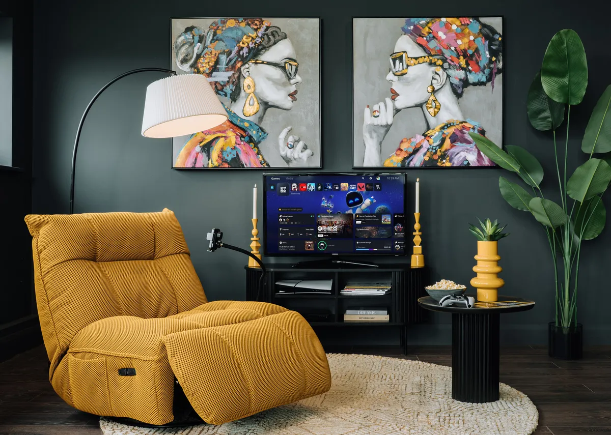 A lifestyle image of the Jave glider with a swivel with Contessa prints and Arc floor lamp.