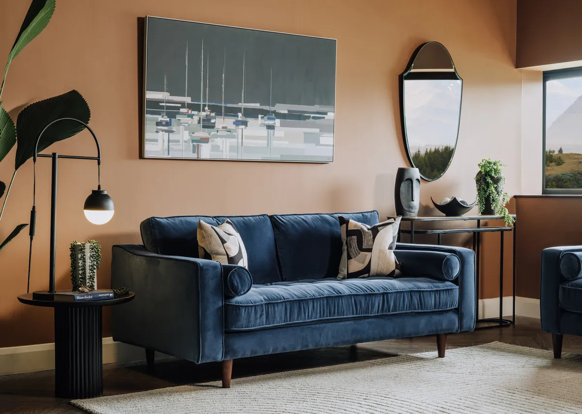 A lifestyle image of the Genoa 3 seater sofa with Marina mirror and Side by Side canvas