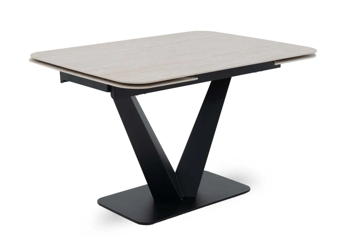 A cream travertine dining table in fixed mode from EZ Livings Tuscan range.