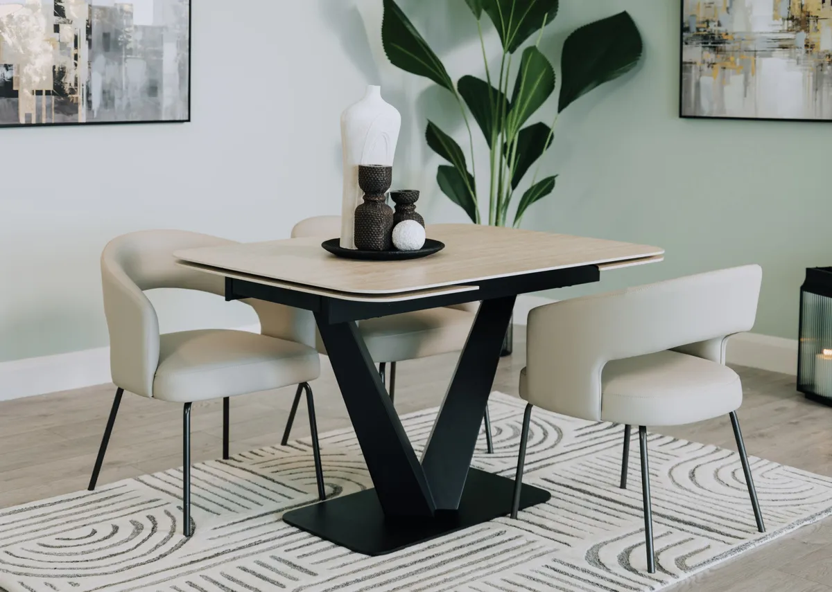 A lifestyle image of the Tuscan dining table closed with Matteo chairs and Lifted Canvas