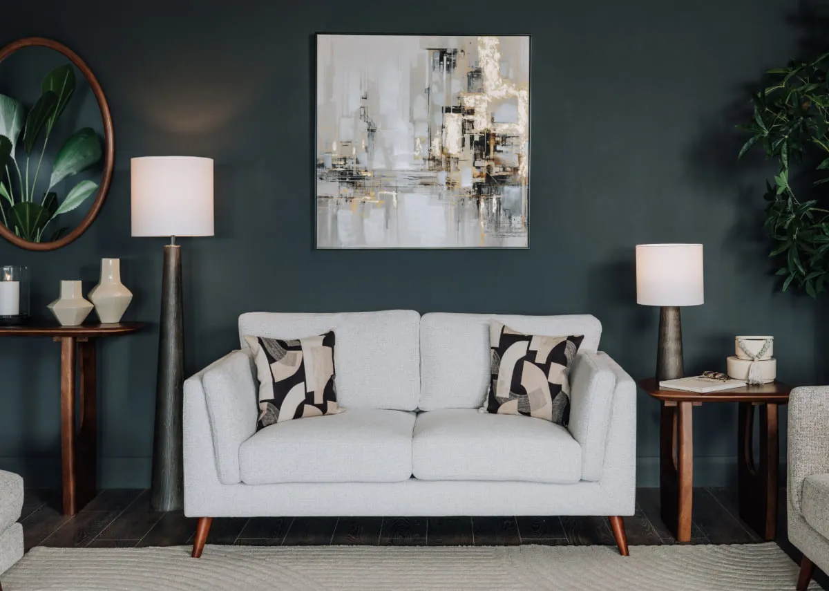 A lifestyle image of the Lifted 2 canvas with Jet console and side table