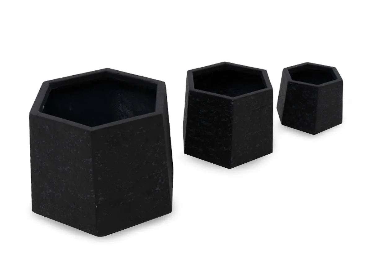 A set of 3 black clay planters from EZ Livings Ferrara range.Angled view.
