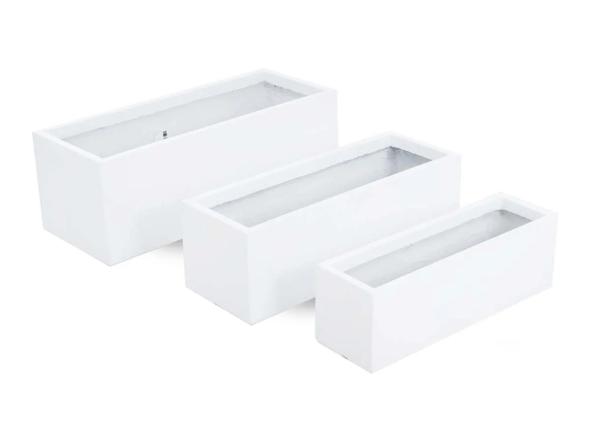 A set of 3 white rectangular rattan planters from EZ Livings Clay Planter range. Angled view
