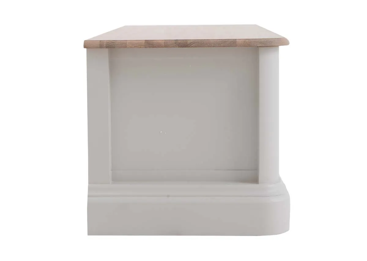 A grey wood blanket box from EZ Livings Kylemore range. Side view of carved panel sides