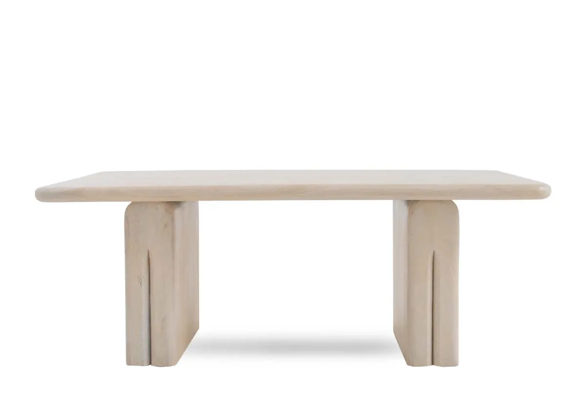 A natural coffee table from EZ Livings Ezra range.Front veiw of chunky base