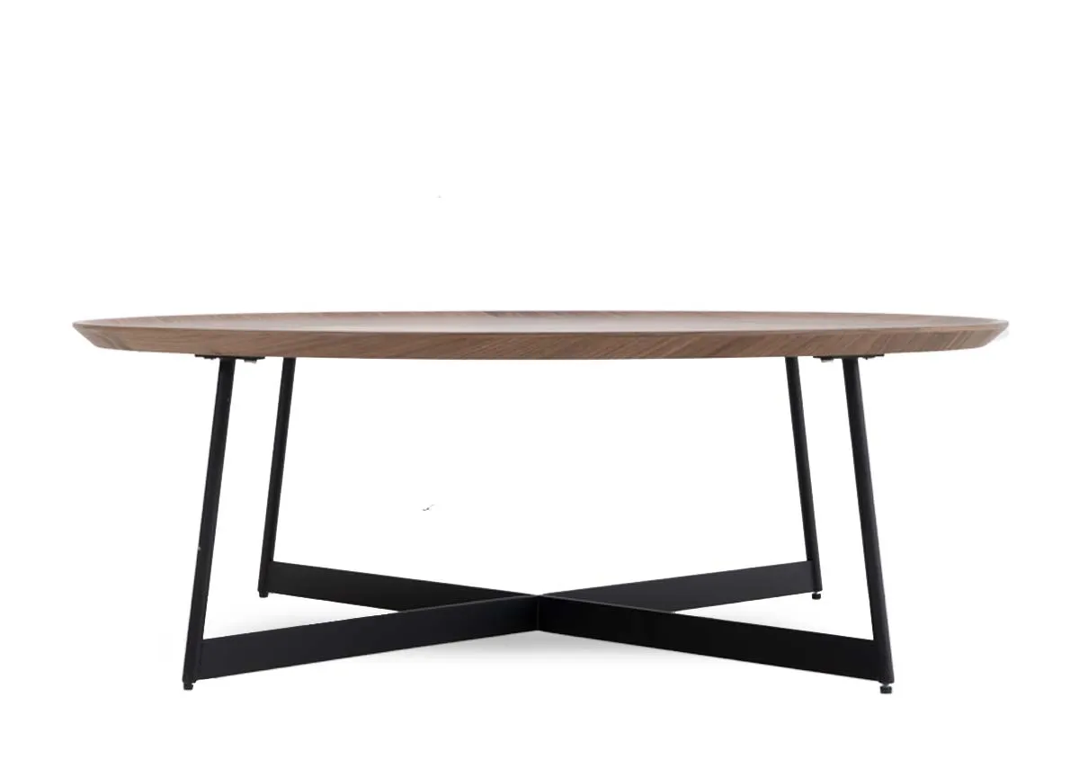 A round walnut veneer coffee table with metal legs from EZ Livings Bonita range.Closeup of matt metal legs