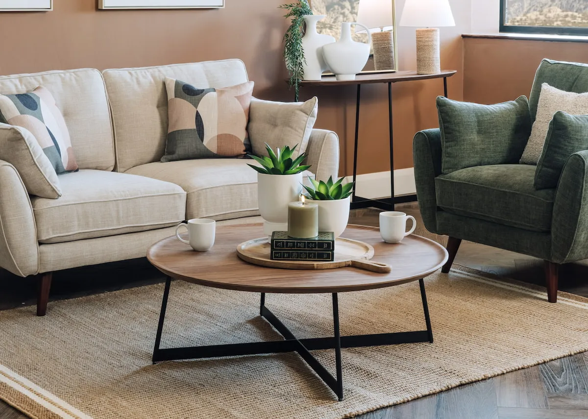A lifestyle image of the Bonita coffee table with Caoimhe sofas and Novato rug.