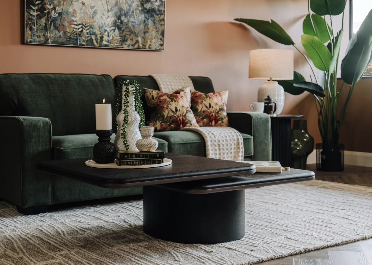 A lifestyle image of the Ellen coffee table with the Genoa green sofa with Fanciful canvas.