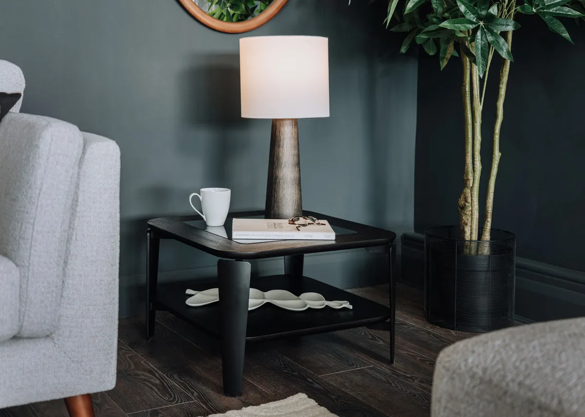 A lifestyle image of the Lana side table with Tate lamp