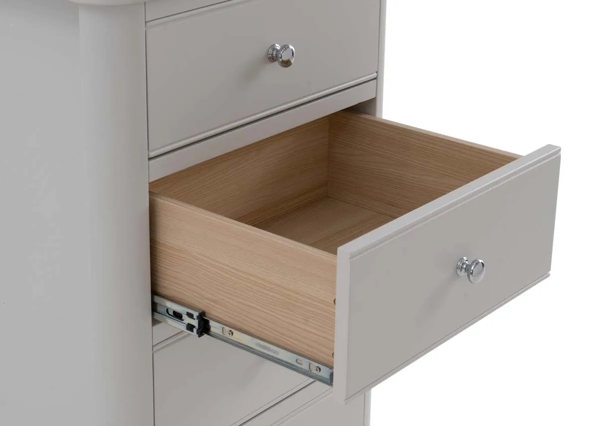 A grey tallboy chest from EZ Livings Kylemore range. Closeup of drawers open show storage