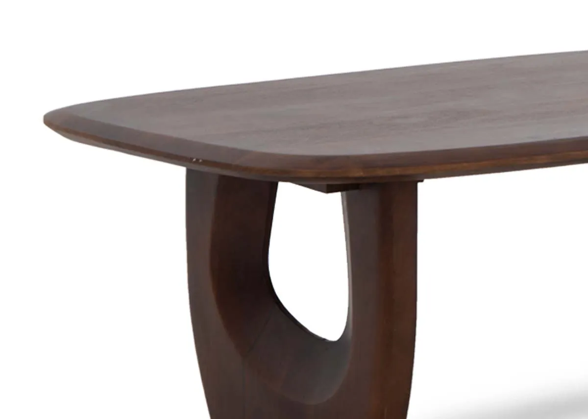 An oval rectangular coffee table with carverich brown finishd legs from EZ Livings Jet range. Closeup of the