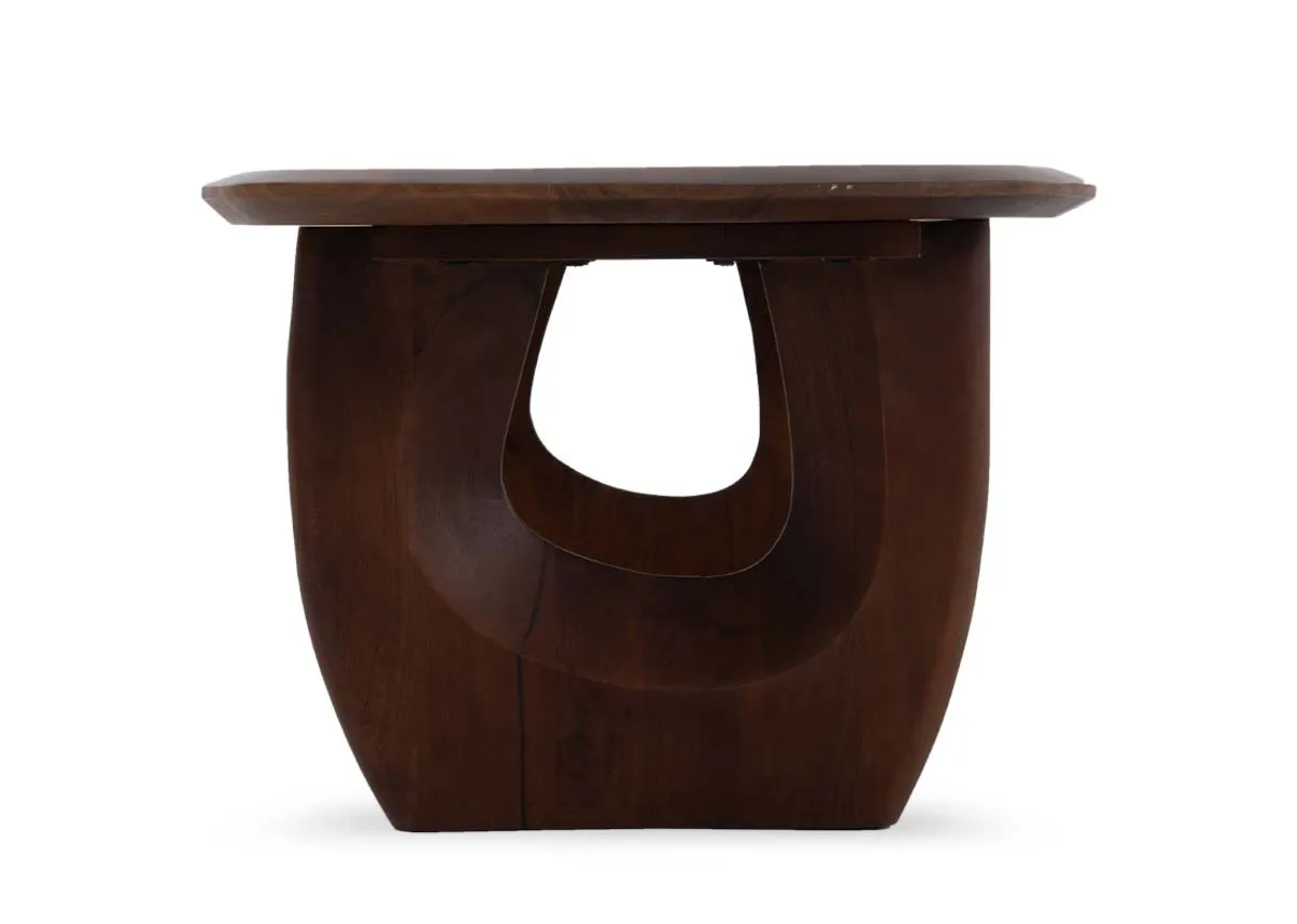 An oval rectangular coffee table with carved legs from EZ Livings Jet range. Front view