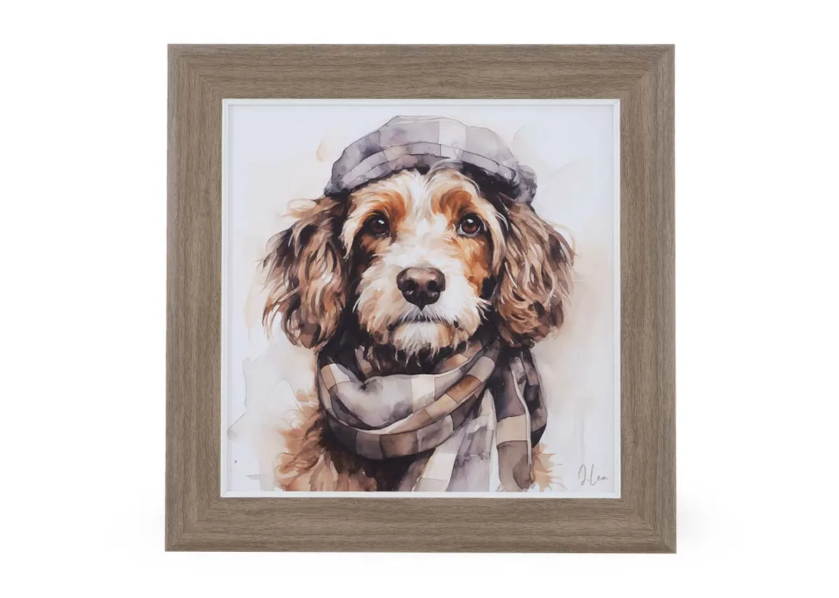 A square framed print of a king charles dog with a hat & scarf from EZ Livings Wall art collection. Front view of Archie.