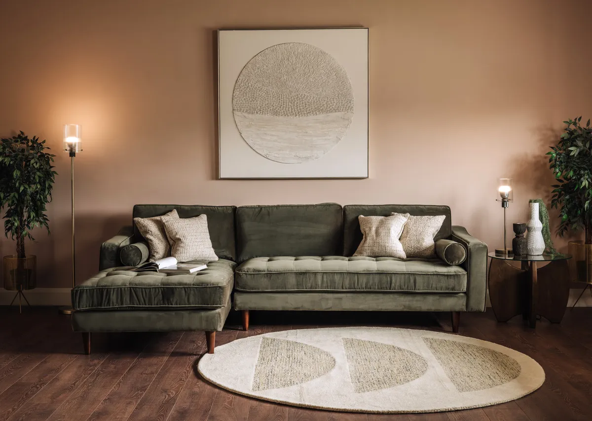 A lifestyle image of the Genoa green chaise with Pathway and round rug and karina leaane lamps