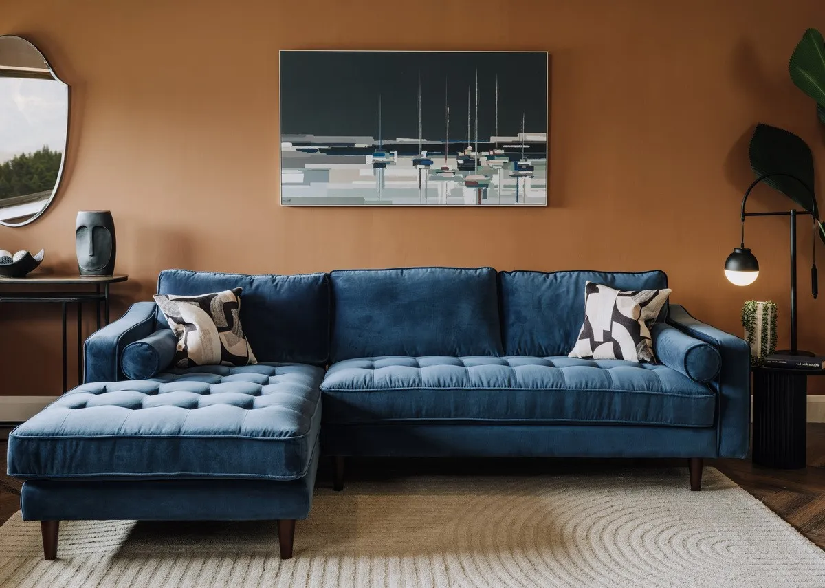 A lifestyle image of the Genoa blue velvet chaise with Harbourside canvas with casper lights