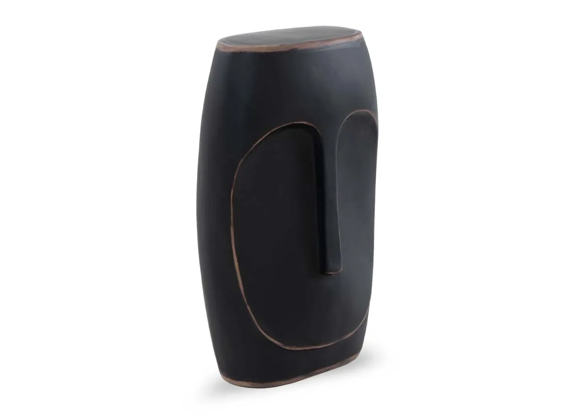 A side shot of a black ornament with face outline from EZ Livings Bluebell range.