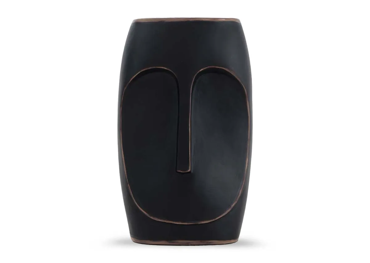 An angled shot of a black ornament with face outline from EZ Livings Bluebell range.
